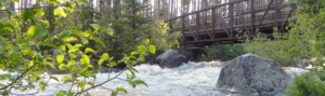 A river with rapids and rocks in the water.